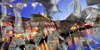 Disney's BoardWalk with dollar bills in front