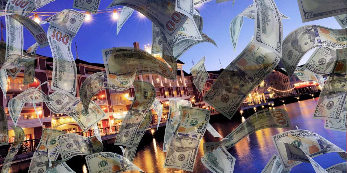 Disney's BoardWalk with dollar bills in front