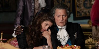 Johnny Depp as King Louis XV and Maiwenn as Jeanne du Barry