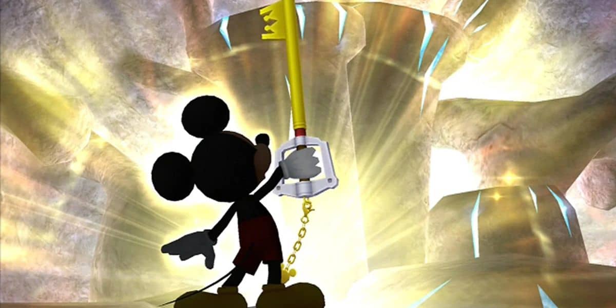 Mickey Mouse stands heroically with a large key-shaped weapon in a cave illuminated by light shining from above, reminiscent of a scene from Kingdom Hearts.