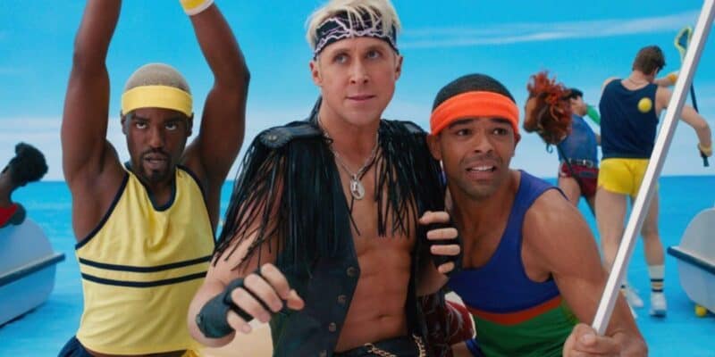 Three of the Kens (Ncuti Gatwa, Ran Gosling, and Kingsley Ben-Adir) getting ready to fight on the beach
