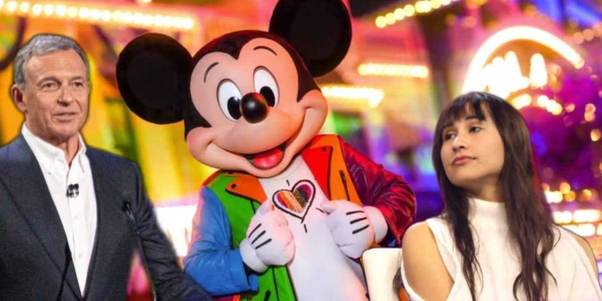 Walt Disney Company CEO Bob Iger and Chloe Cole on opposite sides of Mickey Mouse at Pride Night at Disneyland