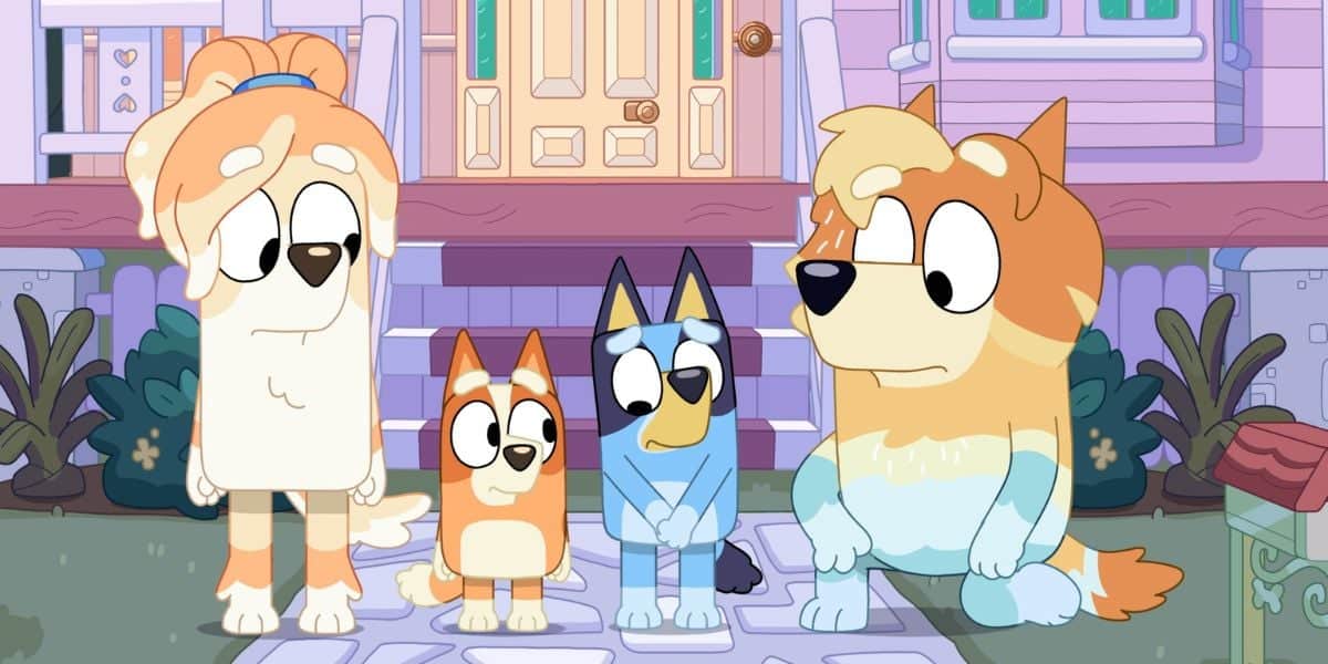 Four animated dogs, including Bluey, with human-like expressions standing in front of a colorful house, each showcasing a different emotion.