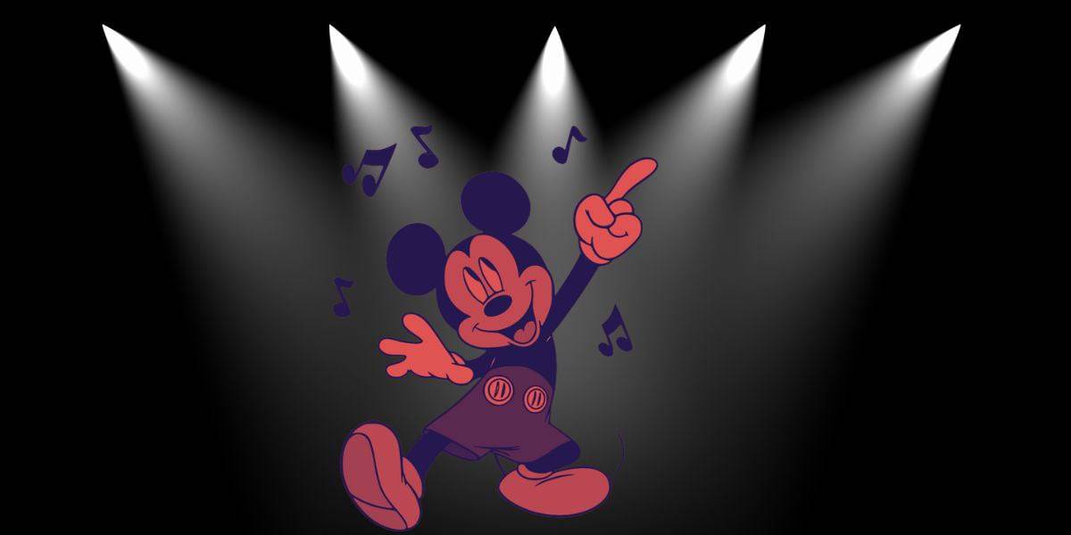 Mickey mouse in the spotlight, dancing to the music.