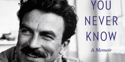 Black and white portrait of a smiling middle-aged man with a mustache, featured on the cover of his memoir titled "Toy Story 5: Success You Never Know.