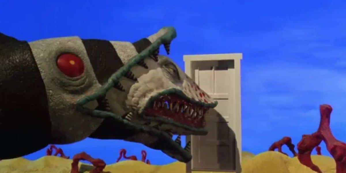 A scene reminiscent of Tim Burton's style, featuring a large, menacing worm-like creature with sharp teeth, black and white stripes, and a red eye. The Beetlejuice-like creature is approaching an open white door standing in a surreal, colorful landscape with a blue sky and yellow ground dotted with red shapes.