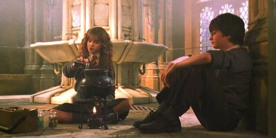 Harry Potter and the Chamber of Secrets Harry Potter and Hermione Granger sit in the girl's bathroom