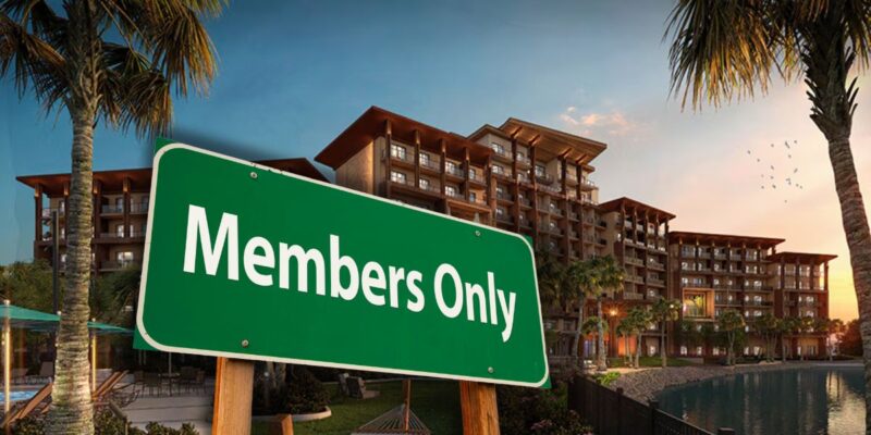 A "members only" sign in the foreground with a Disney resort background, featuring a large building surrounded by palm trees and a pool, under a vibrant evening sky.