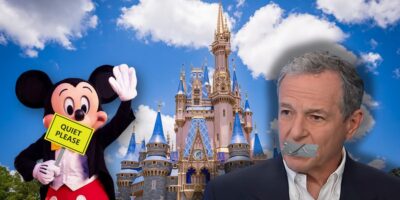 A digitally edited image showing Disney's Mickey Mouse holding a "Quiet Please" sign in front of a castle, with a man having duct tape over his mouth in the foreground. The sky is clear with some fluffy clouds.