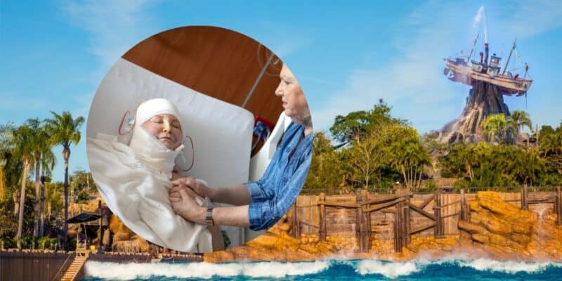 In front of a Disney water park with a pirate ship on a rocky hill, the circular inset shows a person in a hospital bed, wrapped in bandages, being attended to by a caregiver. The caregiver gently touches the patient’s hands, providing comfort.