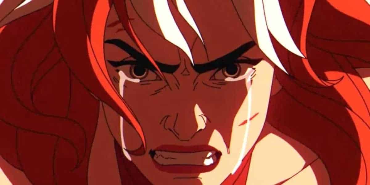 Rogue with long red and white hair, furrowed brows, and an intense expression is shown in a close-up. Tears run down their face, highlighting an emotional moment reminiscent of the X-Men. The lighting casts deep shadows, accentuating the dramatic scene.