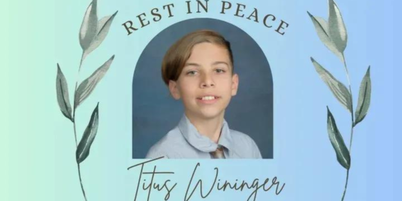 A memorial image with a photo of a young boy wearing a light blue shirt and tie, framed by decorative leaves on both sides. Text above the photo reads "Rest in Peace," and the name "Titus Wininger, 11 year old dies at Wild River Water Park in Irvine California," is written below in cursive.