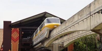 A yellow-striped monorail at Disney World