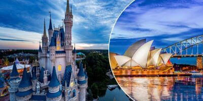 The image features a composite of two landmarks: on the left, Cinderella Castle at Disney World in Orlando during twilight, and on the right, the Sydney Opera House and Sydney Harbour Bridge illuminated at night, reflected in the water.