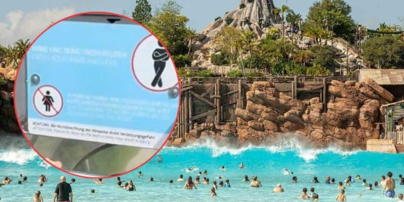 A busy wave pool at a water park with people swimming and playing in the water, one of the top attractions. A rocky mountain and lush greenery are in the background. In the foreground, there is an inset of a sign with safety instructions, though the text on the sign is not fully clear.