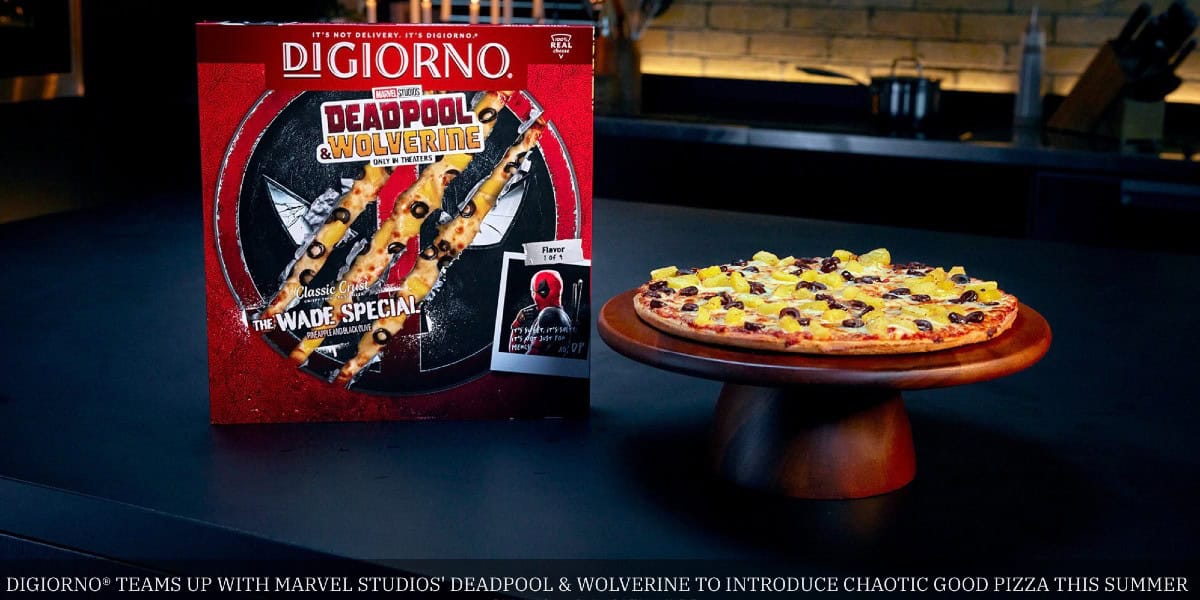 A DiGiorno pizza box is displayed next to a cooked pizza on a wooden stand. The box features Deadpool and Wolverine branding, promoting "The Wade Special" pizza. The caption at the bottom reads, "DiGiorno® Teams Up with Marvel Studios’ Deadpool & Wolverine to Introduce Chaotic Good Pizza This Summer.
