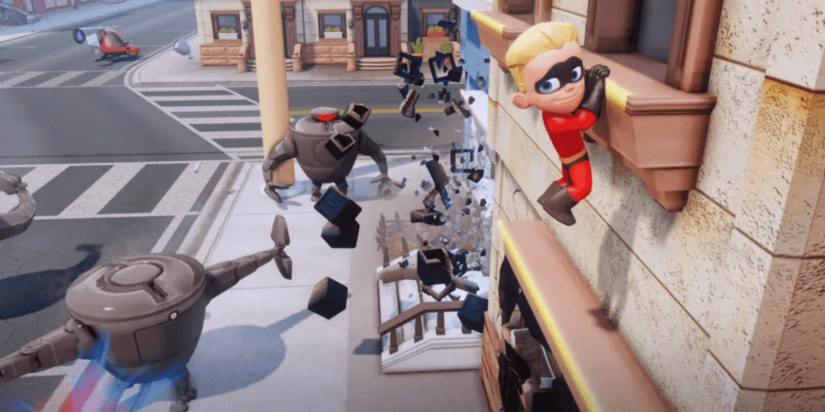 An animated superhero child in a red suit clings to a building's ledge while looking down. Below, two large robots wreak havoc, smashing through structures. The scene takes place in an urban setting with buildings, a crosswalk, and streets visible.