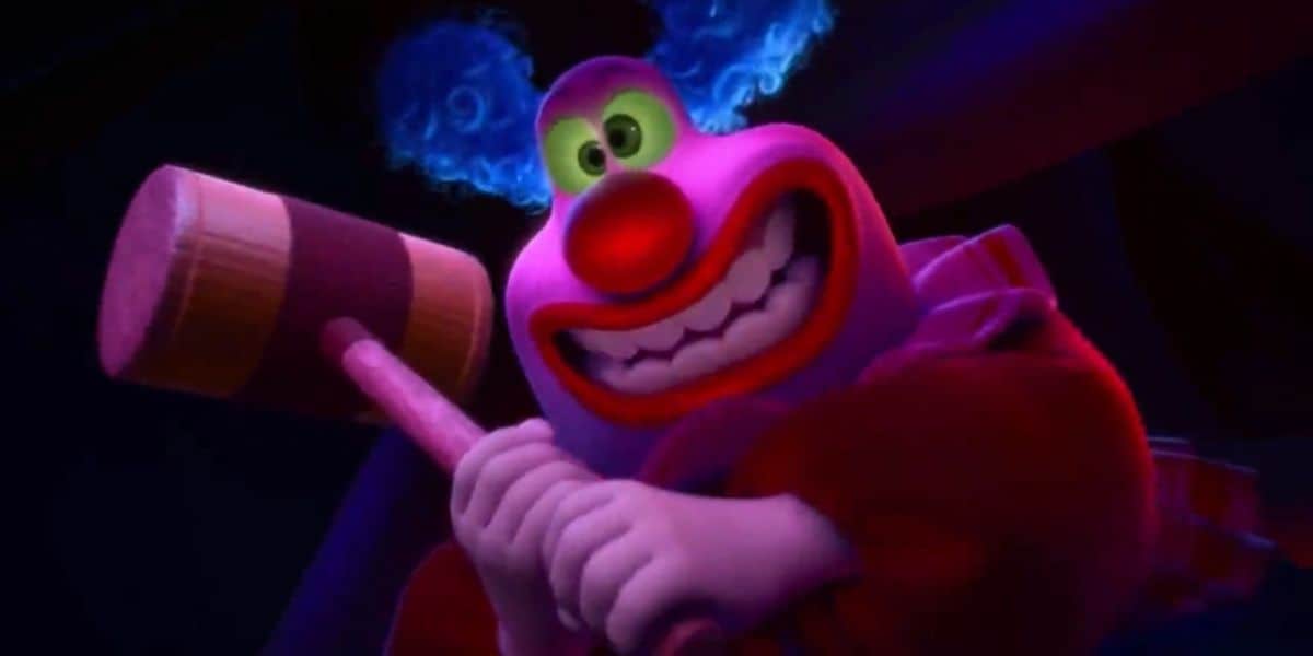 A clown-like character with bright pink skin, green eyes, and blue hair is grinning maniacally while holding a large wooden mallet with both hands. The character, reminiscent of a twisted Pixar creation, wears a red outfit and stands against a dark background.