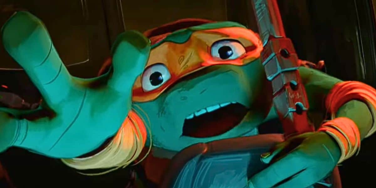 Michelangelo (Shamon Brown Jr.) reaching out for help during the car crash in 'Mutant Mayhem'