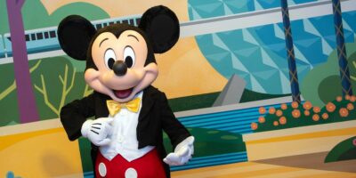 Disney character performer dressed as Mickey Mouse at EPCOT