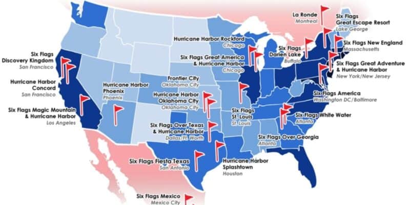 Map of the United States showing locations of various Six Flags theme parks, marked with red flag icons. Parks are spread across the country from California to New York, Texas to Illinois, encompassing amusement parks, water parks, and holiday-themed parks.