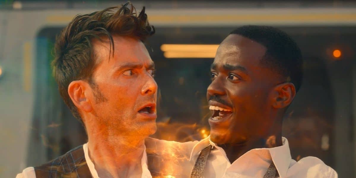 Two individuals appear to be undergoing a transformation. One looks shocked, with wide eyes and messy hair, while the other has a joyful expression. Both men are illuminated by a warm, glowing light coming from their bodies.