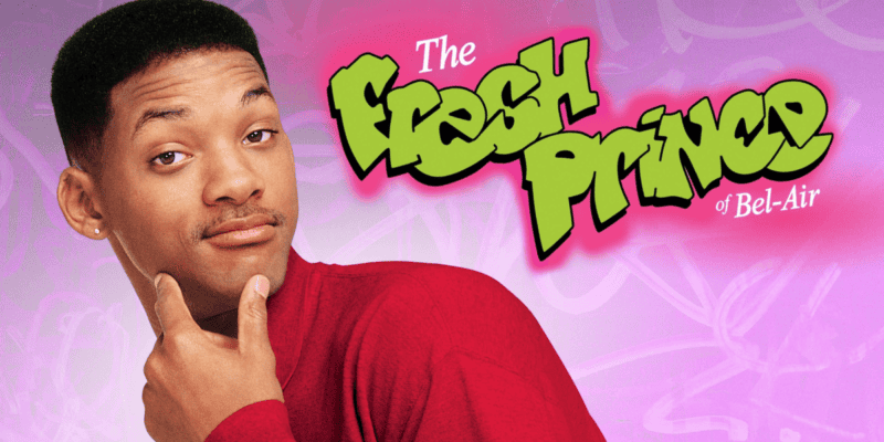 Promotional image for "The Fresh Prince of Bel-Air." The background is pink and purple with graffiti-style text that reads "The Fresh Prince of Bel-Air" in green and white. On the left, Will Smith, wearing a red shirt, poses with a finger on his cheek, looking directly at the camera.