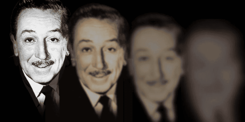 Four portraits of the same smiling man with a mustache are shown progressively blurring from left to right, starting with a detailed image on the far left and ending with a very blurred image on the far right. The background is dark.