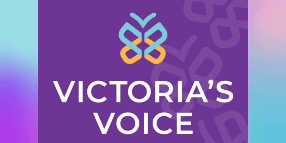 A purple background featuring a butterfly logo with blue and yellow wings above the text "VICTORIA'S VOICE" in bold, white capital letters. The edges have gradient shades of cyan and pink, with a subtle butterfly pattern in the background. Amid job cuts, this Disney World competitor stands resilient.