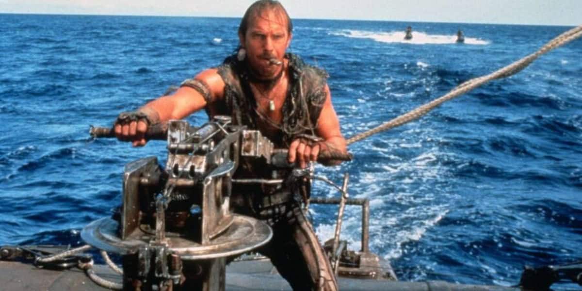 Kevin Costner as the Mariner in Waterworld, using machinery aboard his trimaran.
