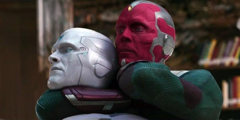 Vision (Paul Bettany) with the White Vision version of the character in a headlock, as seen in WandaVision