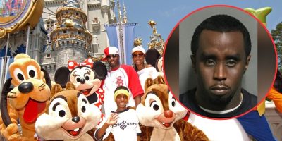 A group of people, including one child, are posing with Disney characters Pluto, Minnie Mouse, Mickey Mouse, and Chip and Dale in front of a castle. Inset in the upper right corner is a serious portrait of a man.