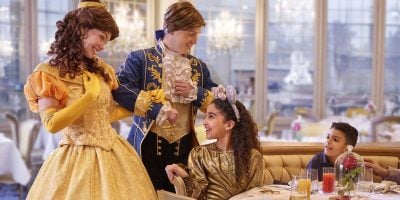 Belle and the Beast (in human form) meet children at La Table de Lumiére in Disneyland Paris' Disneyland Hotel.