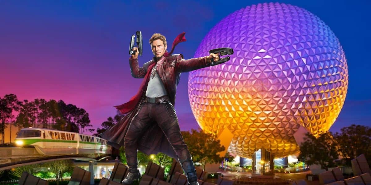 A character dressed in a red coat pointing blasters stands in front of a large geodesic dome against a twilight sky. A monorail train, reminiscent of Disney's magic, passes on the left side of the dome. Trees and purple skies provide a colorful backdrop, hinting at Star-Lord’s Return sooner than you think.