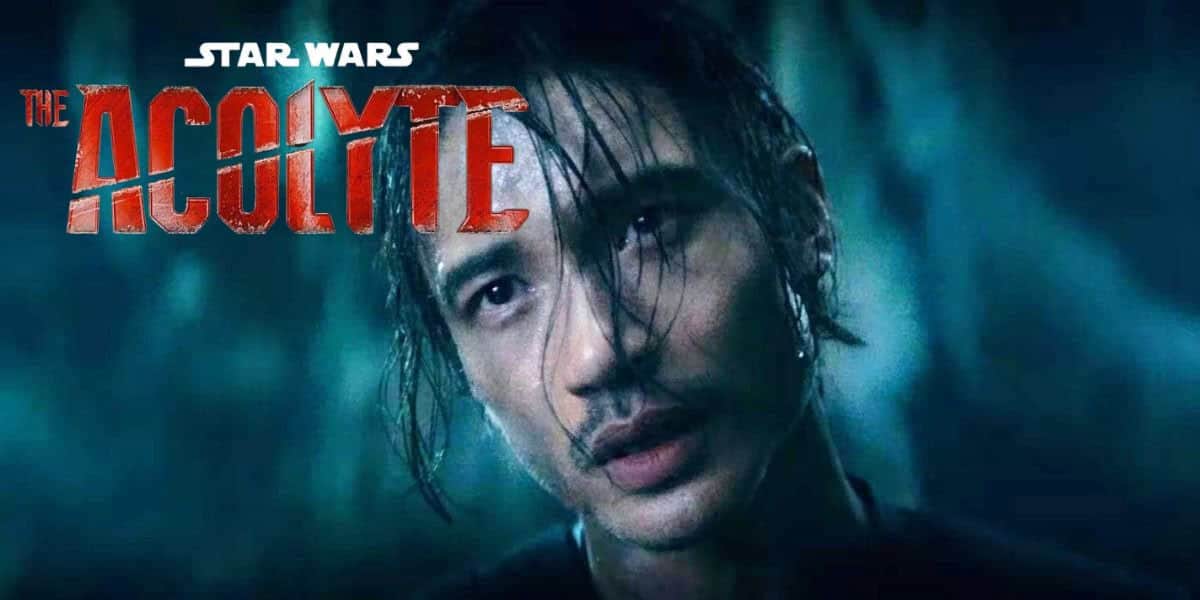 Qimir, AKA The Stranger, in Star Wars: The Acolyte. His hair is hanging off his face and he looks quizzical (in a sinister way).