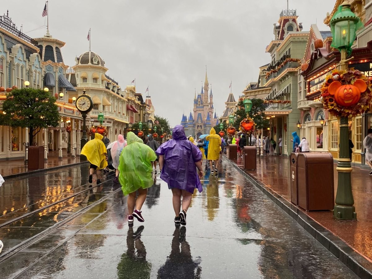 Guests visit the Magic Kingdom on the day Hurricane Milton hit the area inside Disney World as Disney World guests enjoy their time.
