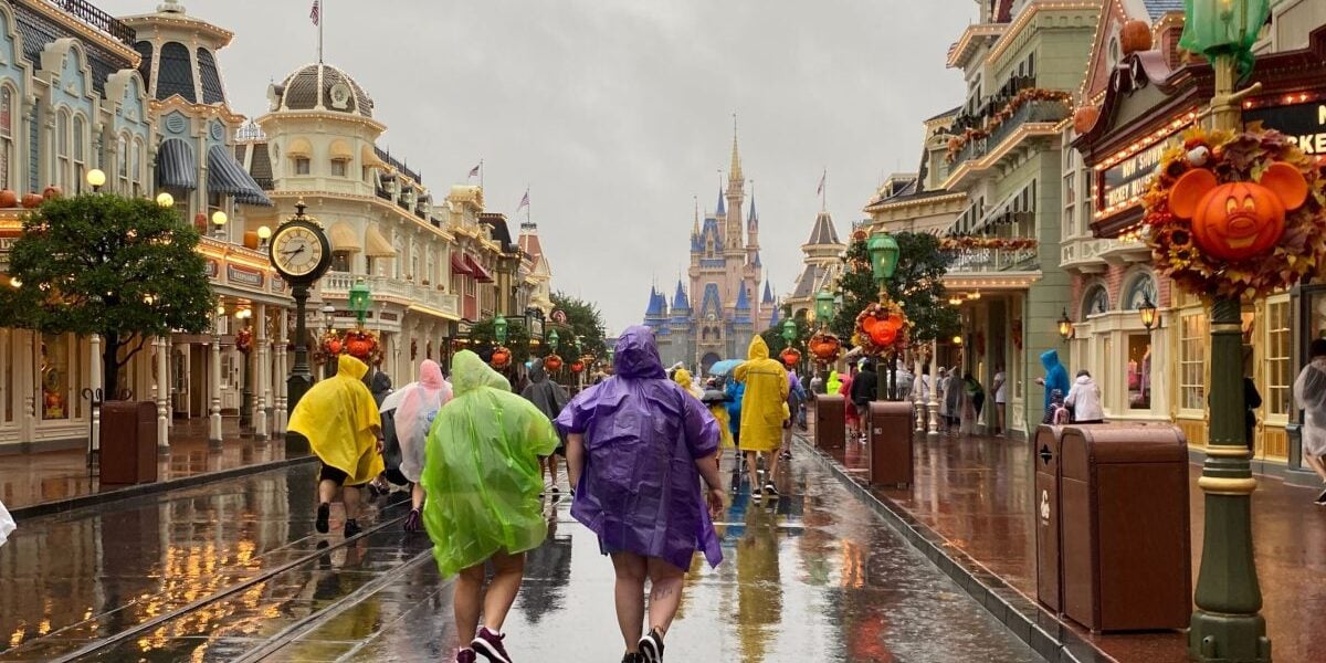 Guests visit the Magic Kingdom on the day Hurricane Milton hit the area