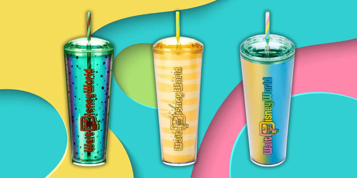 Three vibrant Disney-inspired tumblers, reminiscent of Starbucks designs, are set against an abstract backdrop. The collection includes a green one with dots, a yellow one with stripes, and a blue-to-pink gradient—all proudly showcasing the Walt Disney World logo and now available on sale.