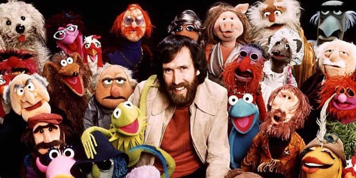 Jim Henson surrounded by The Muppets