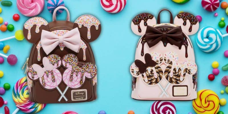 Two colorful backpacks resembling Minnie Mouse ears delight Disney fans with their candy and chocolate themes. One, in brown with a pink bow, and the other, beige with a brown bow, are accented by lollipop ears amidst an array of candies on a blue backdrop.