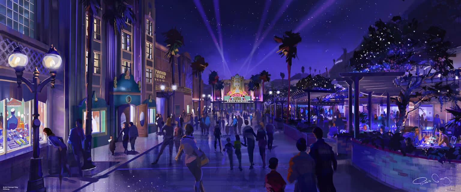 A vibrant nighttime scene of a bustling amusement park welcomes you. Visitors wander past illuminated buildings and streetlamps, with palm trees and beams of light in the sky. A distant, colorful Disney sign adds to the lively atmosphere, celebrating the new park entry in style.