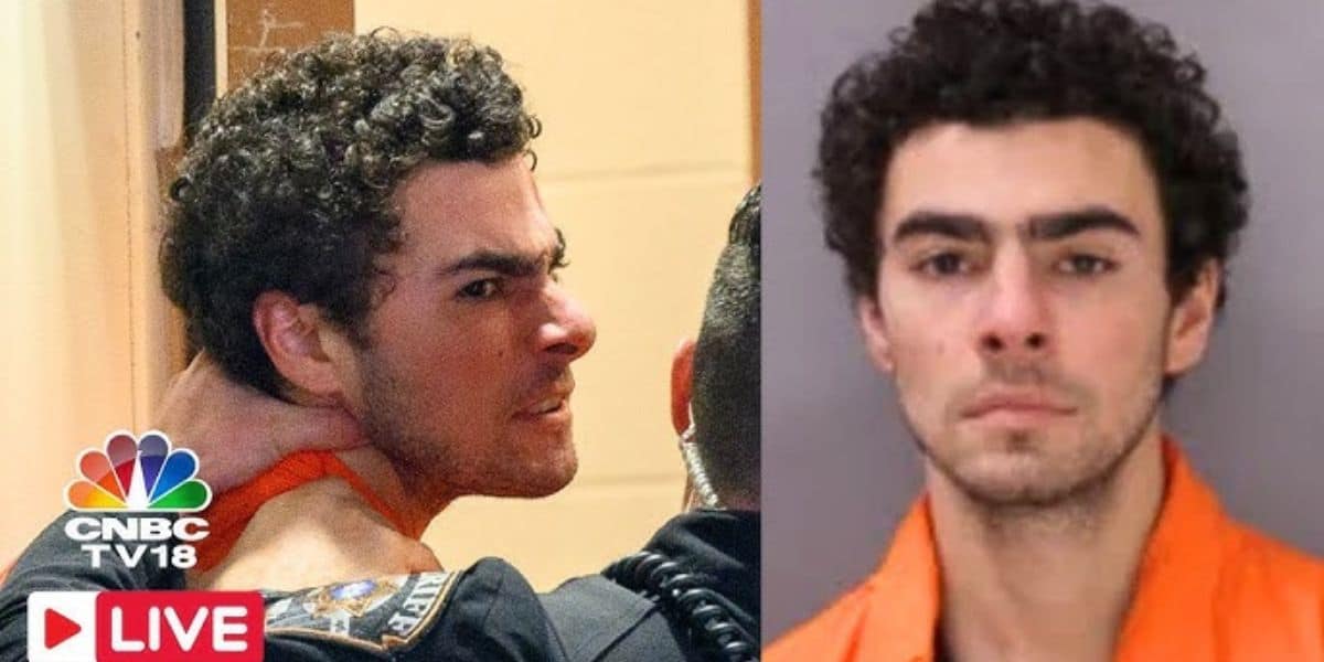 A man with curly hair wearing an orange jumpsuit is shown in two images. On the left, he is facing a police officer, and on the right, a frontal mugshot. The CNBC TV18 logo is visible in the bottom left corner with a "LIVE" tag.