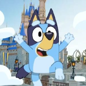 Bluey in front of Cinderella Castle at Walt Disney World Resort's Magic Kingdom