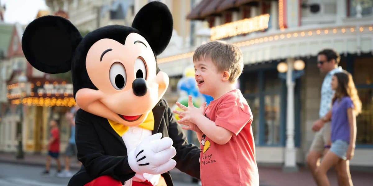 Mickey Mouse with a young boy