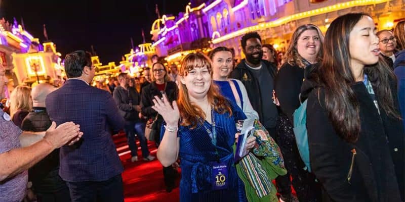 Cast members walk down Main Street, U.S.A. for the Cast Service Celebration