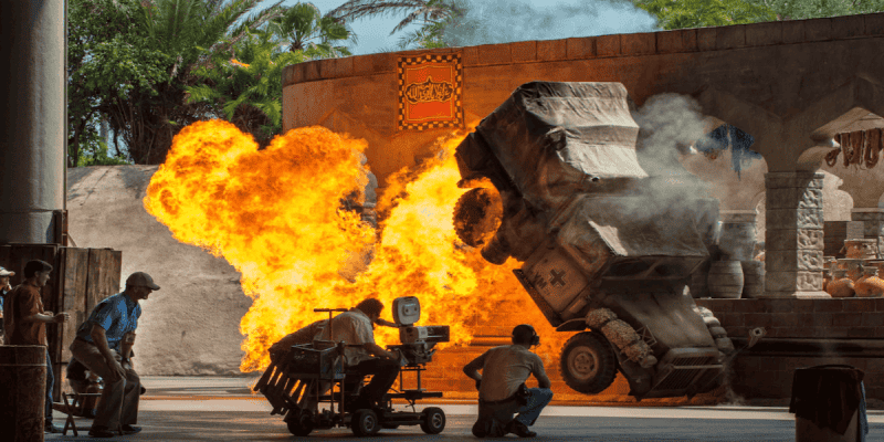 A photo of the Indiana Jones Epic Stunt Spectacular show at Disney World with a stuntman in the background.