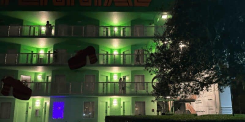 The exterior of one of the 70s buildings at Walt Disney World Resort's Pop Century Resort hotel at nighttime.