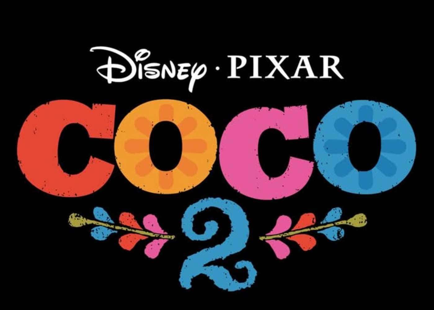 The vibrant "Coco 2" logo bursts with floral decorations against a black backdrop, proudly showcasing the Disney and Pixar names above.