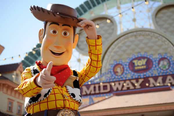 Woody in front of Toy Story Midway Mania on Pixar Pier at Disney California Adventure Park