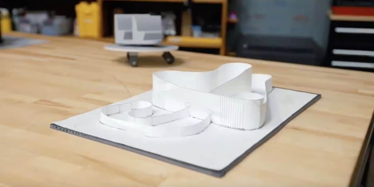A white architectural model of a Cars ride coming to Frontierland at Magic Kingdom. 
